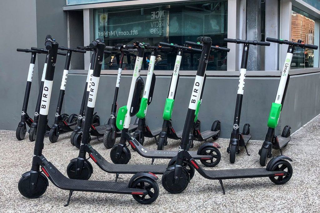 Scooters parked outside an Atlanta storefont