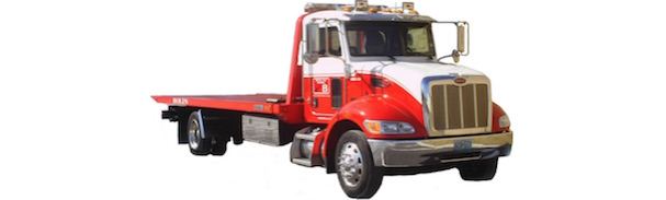 Red and white flatbed truck