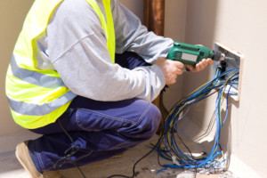 an electrician working on a project in Georgia