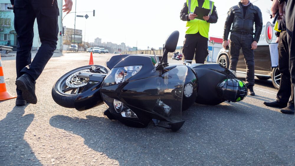 Police investigating motorcycle accident.