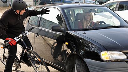 Bicycle rider almost got hit by car