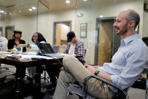 Atlanta Attorney sits with team to discuss personal injury case