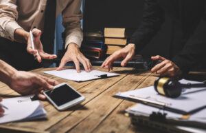 Team of lawyers helping solve the case.