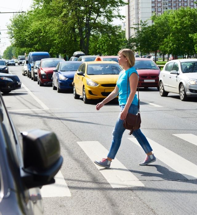 Woman crossing the street