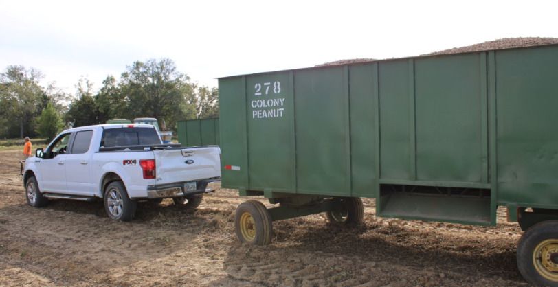 The peanut trailer and pickup truck 